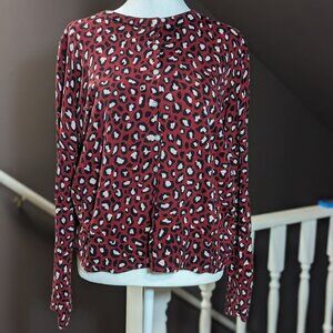 Old Navy Cheetah print cardigan. Red/Black/Pink. Size L. Length 19". Long-sleeve